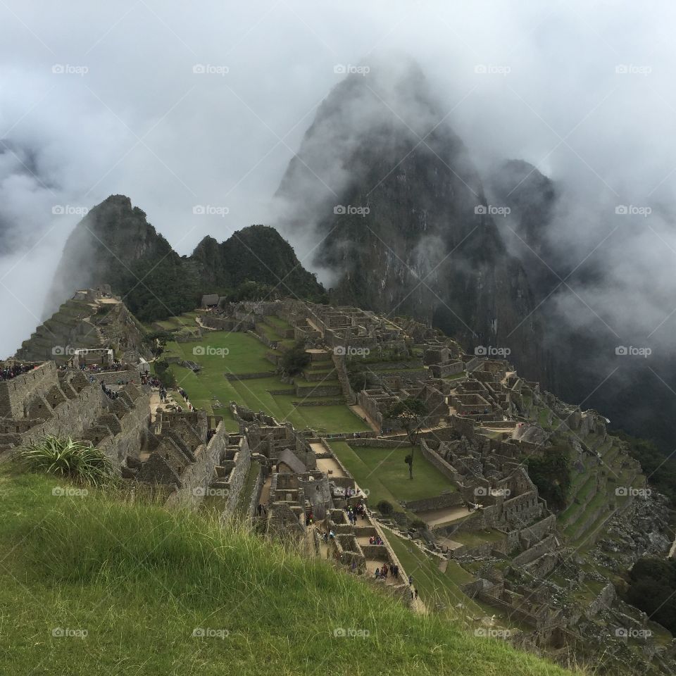 Mist rolling in over Macchu Picchu