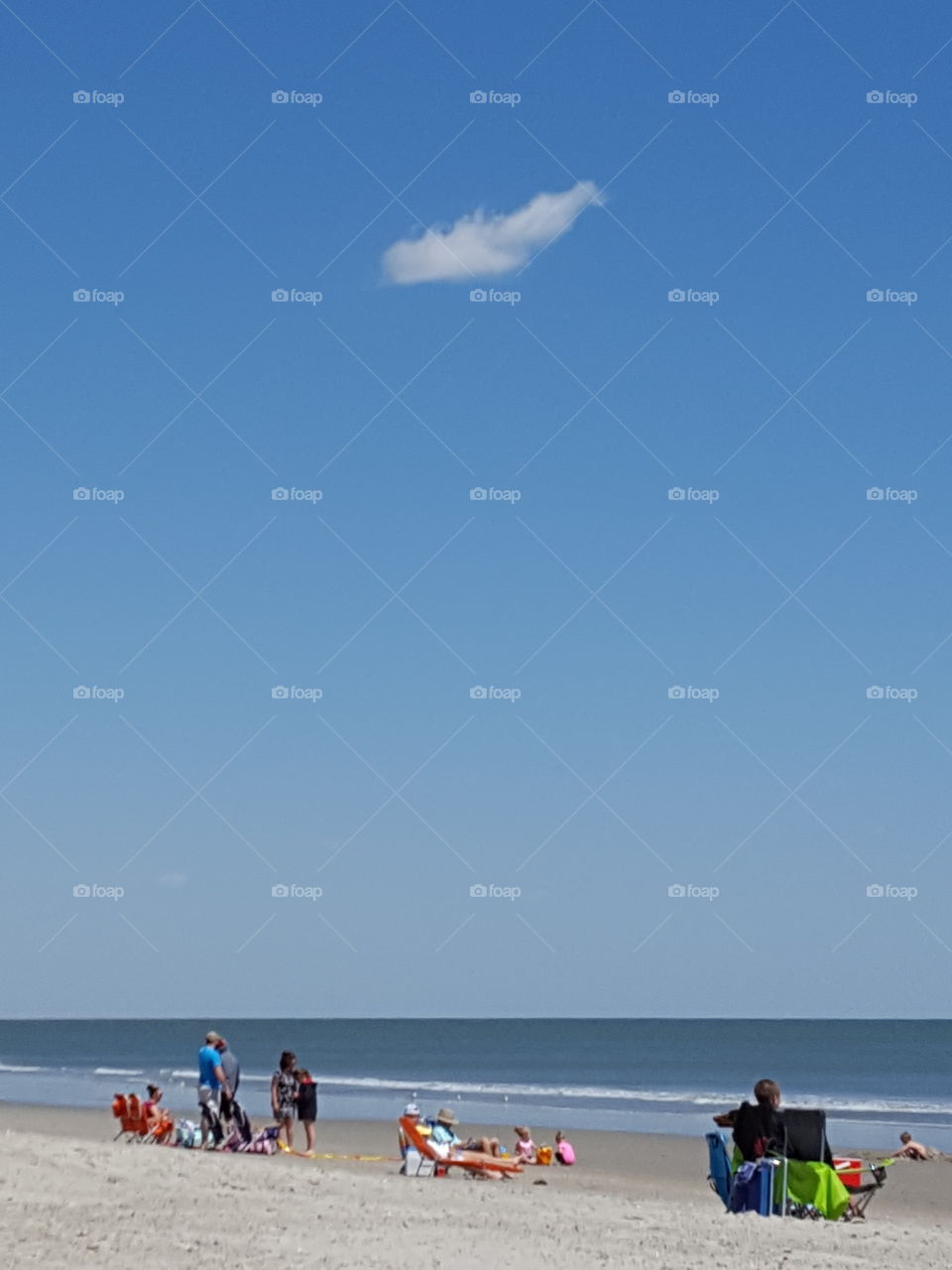 one little cloud on the beach