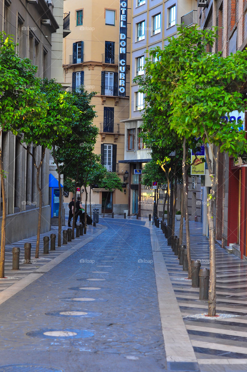 Empty street in the morning in Malaga Spain 