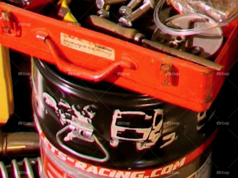 Put your suitcase with tools on the barrel