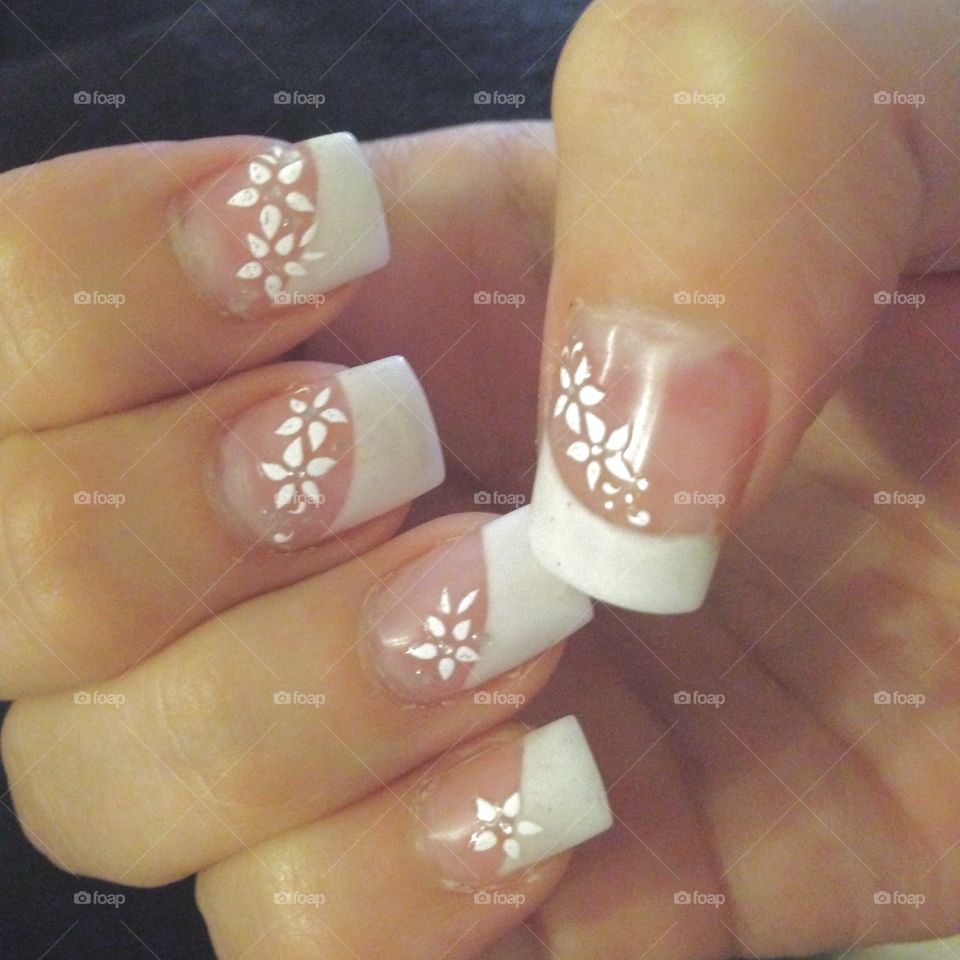 Delicate flower. Bridal style manicure
