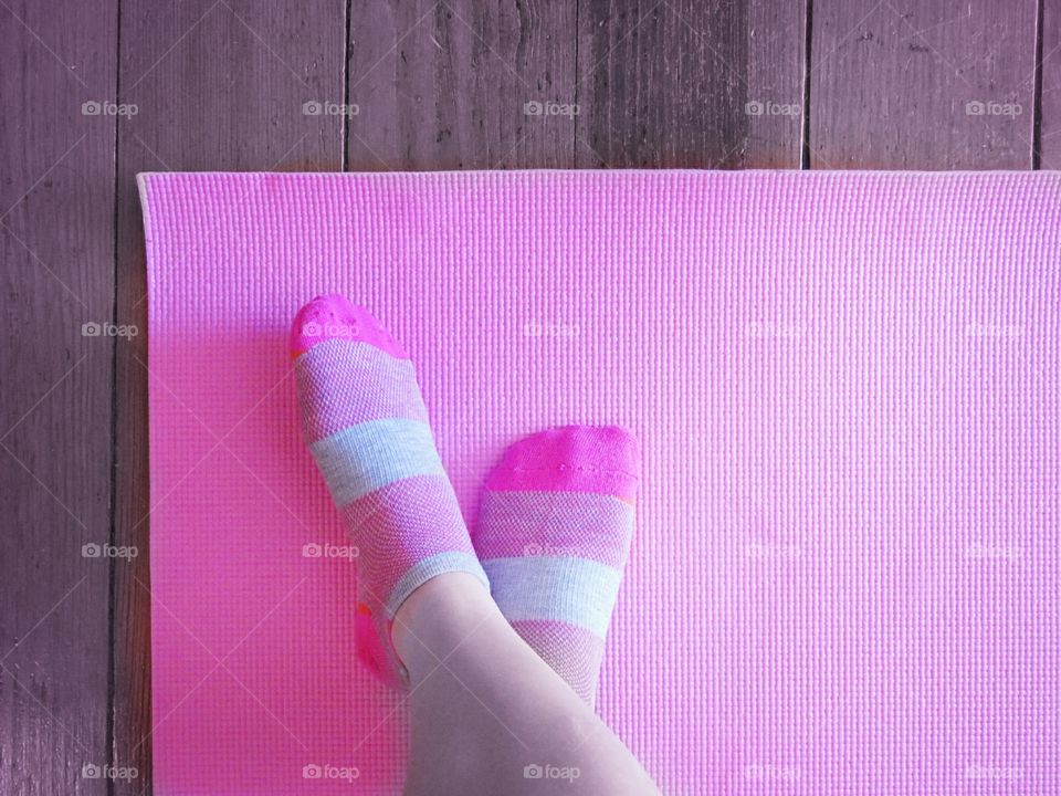 Person wearing pink socks