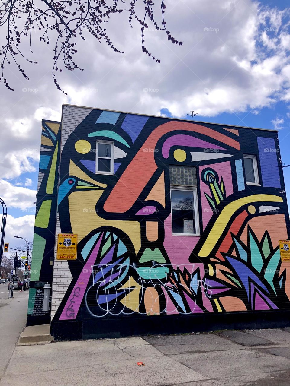 Mural that brightens and brings color to the streets of Montreal. Street art on rue Jarry Est in the Villeray neighbourhood of Montreal. 