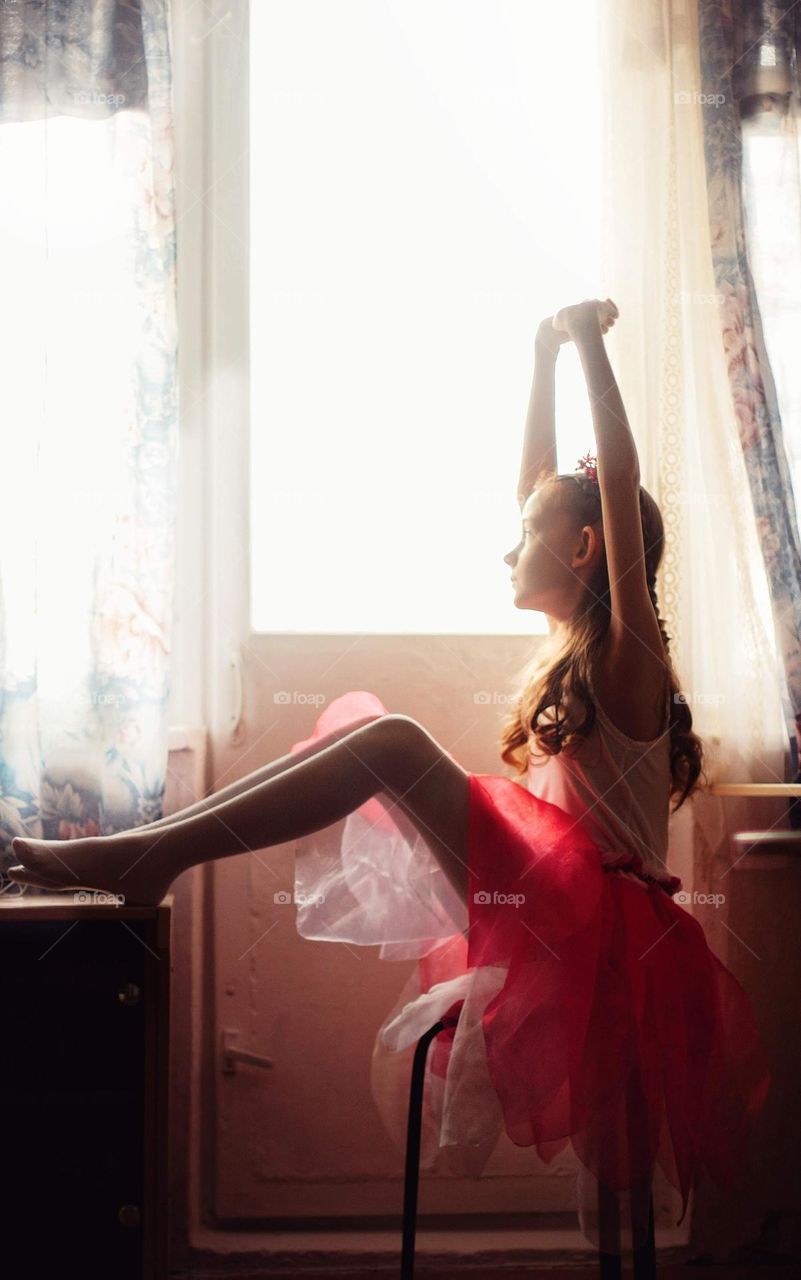 Girl near the window