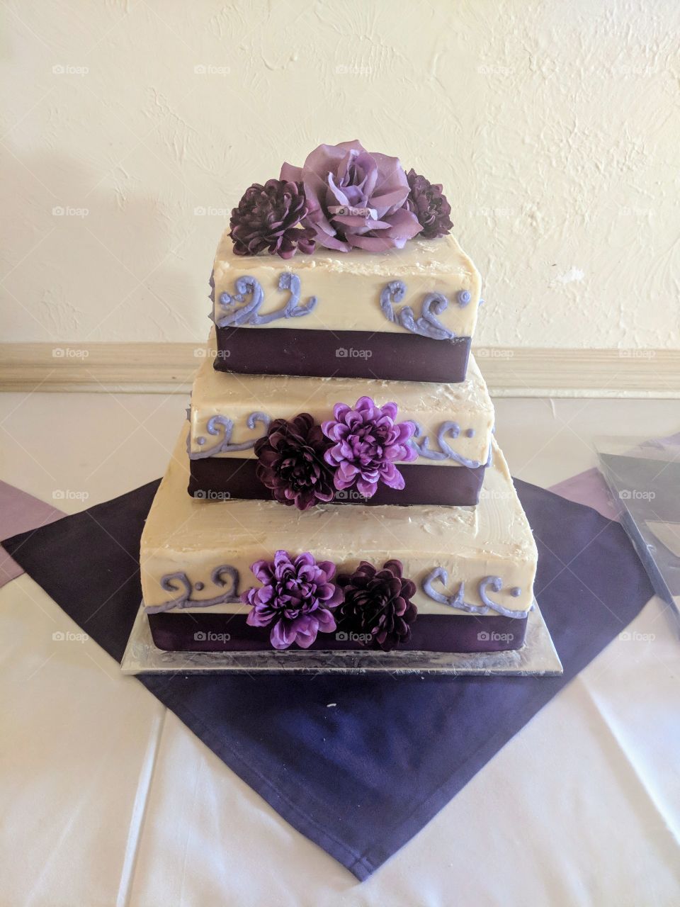 purple and white rustic wedding cake