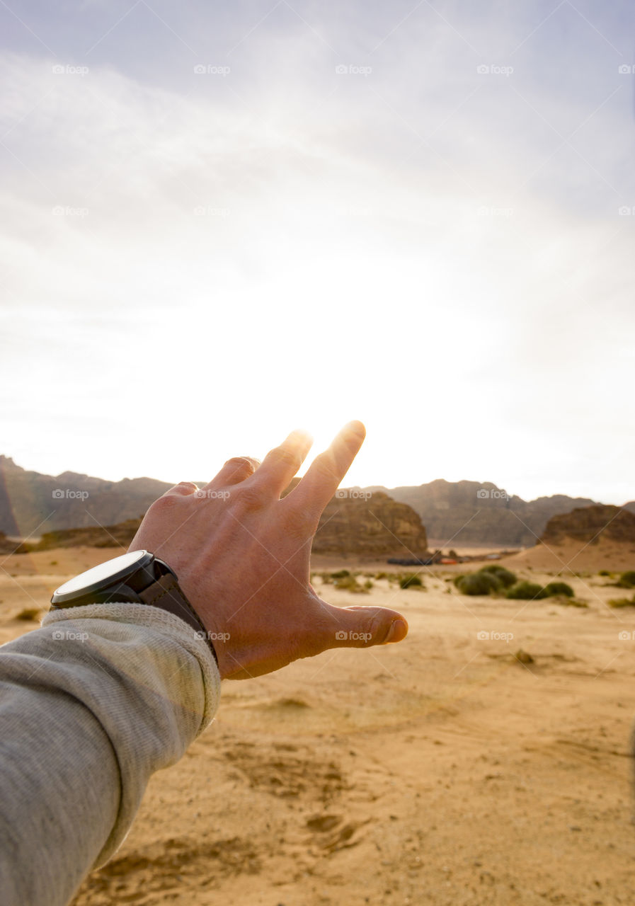 Sunset in the Wadi Rum desert, at the end of a jeep excursion in Jordan