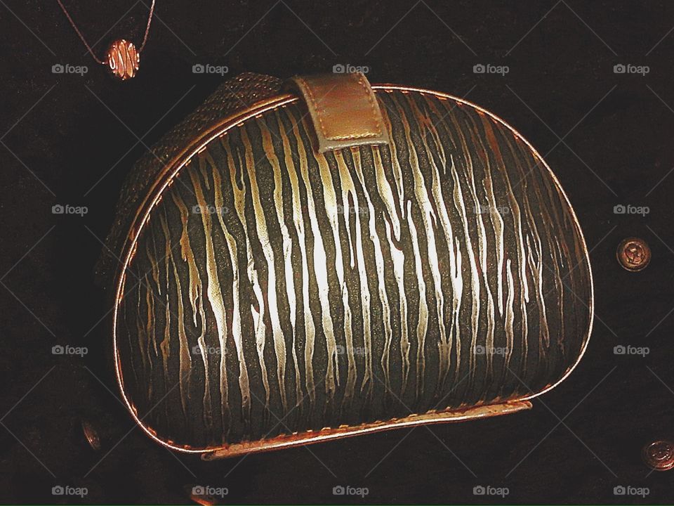 Zebra print gold purse
