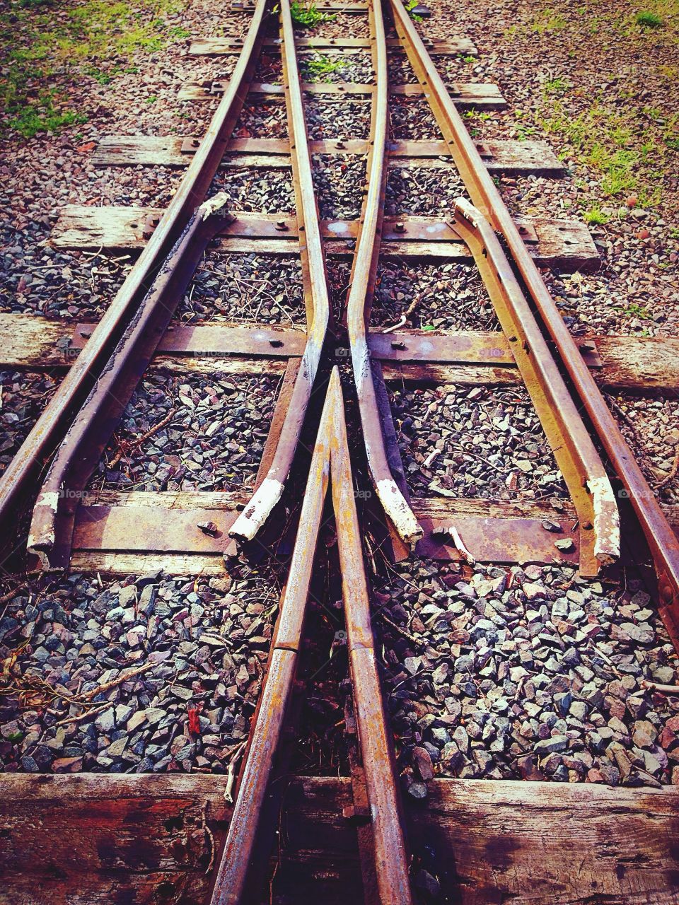 Narrow gauge railway track cross roads