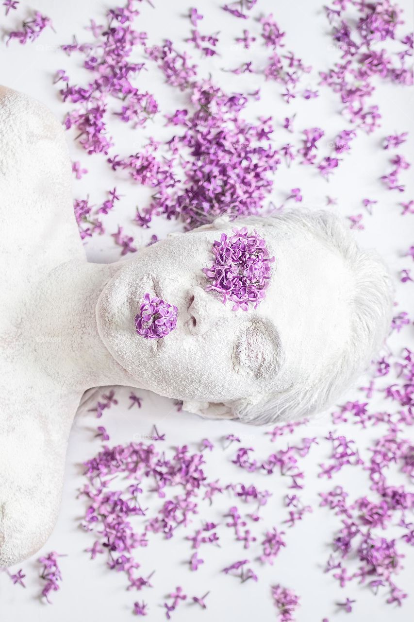 Portrait of the woman with lavender flowers 