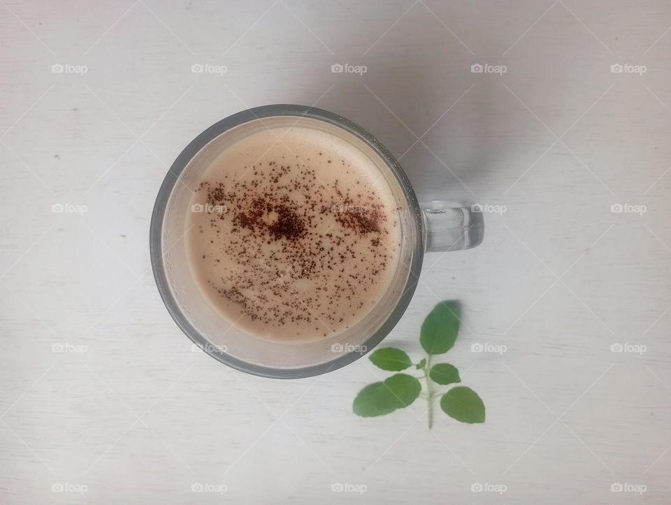 A glass of cappuccino