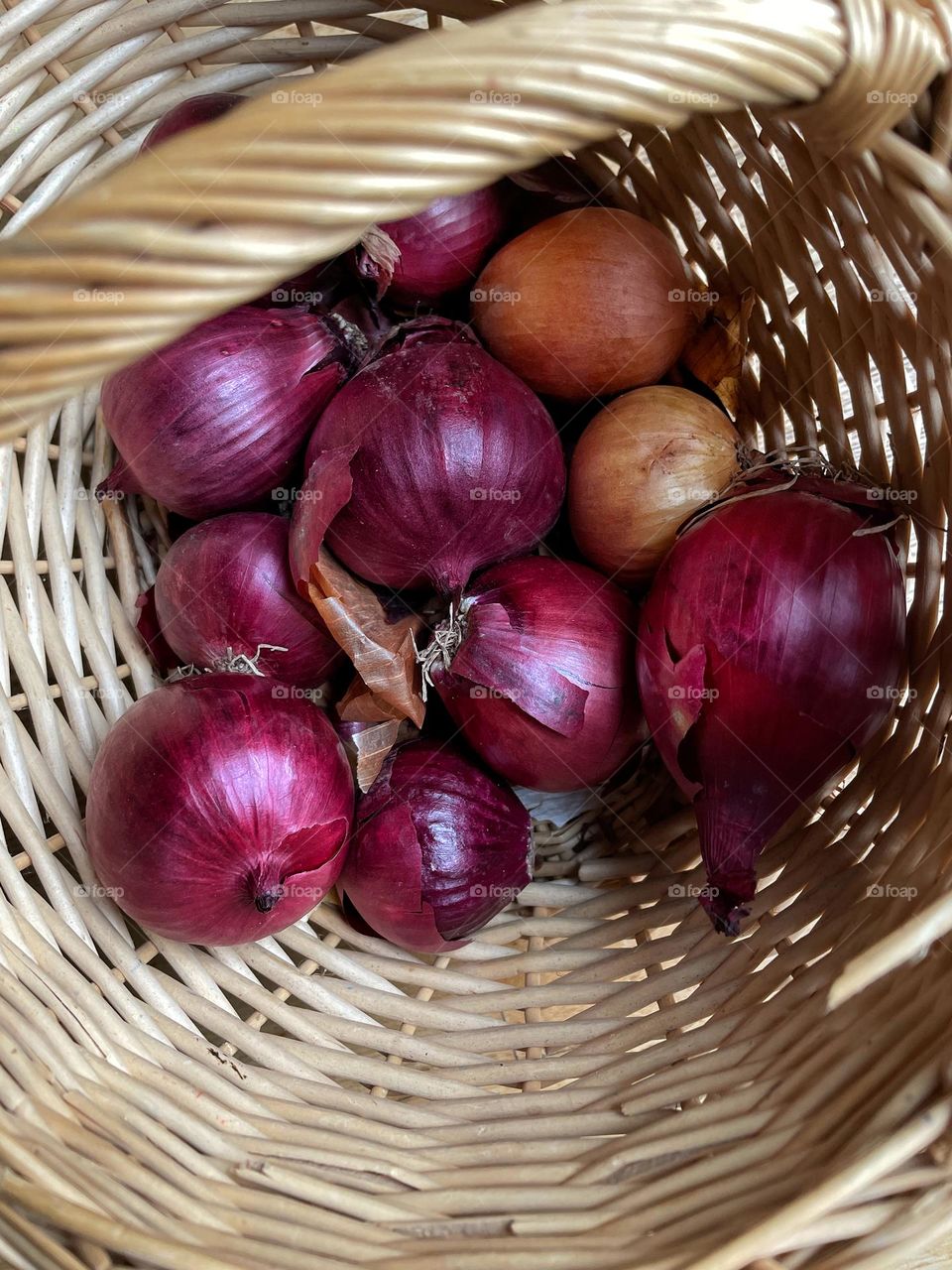 Close-up of red onions in a basket