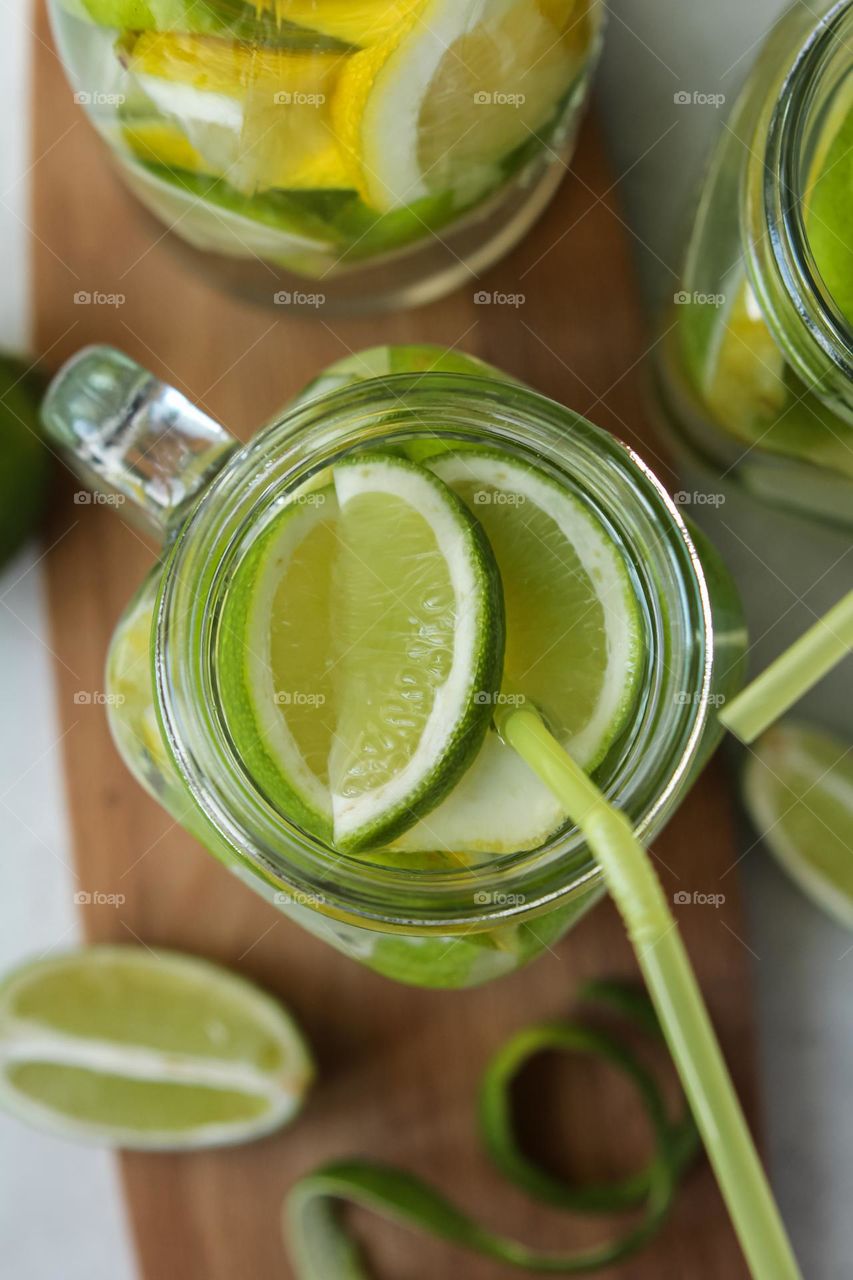 Drink with lime in a clear glass