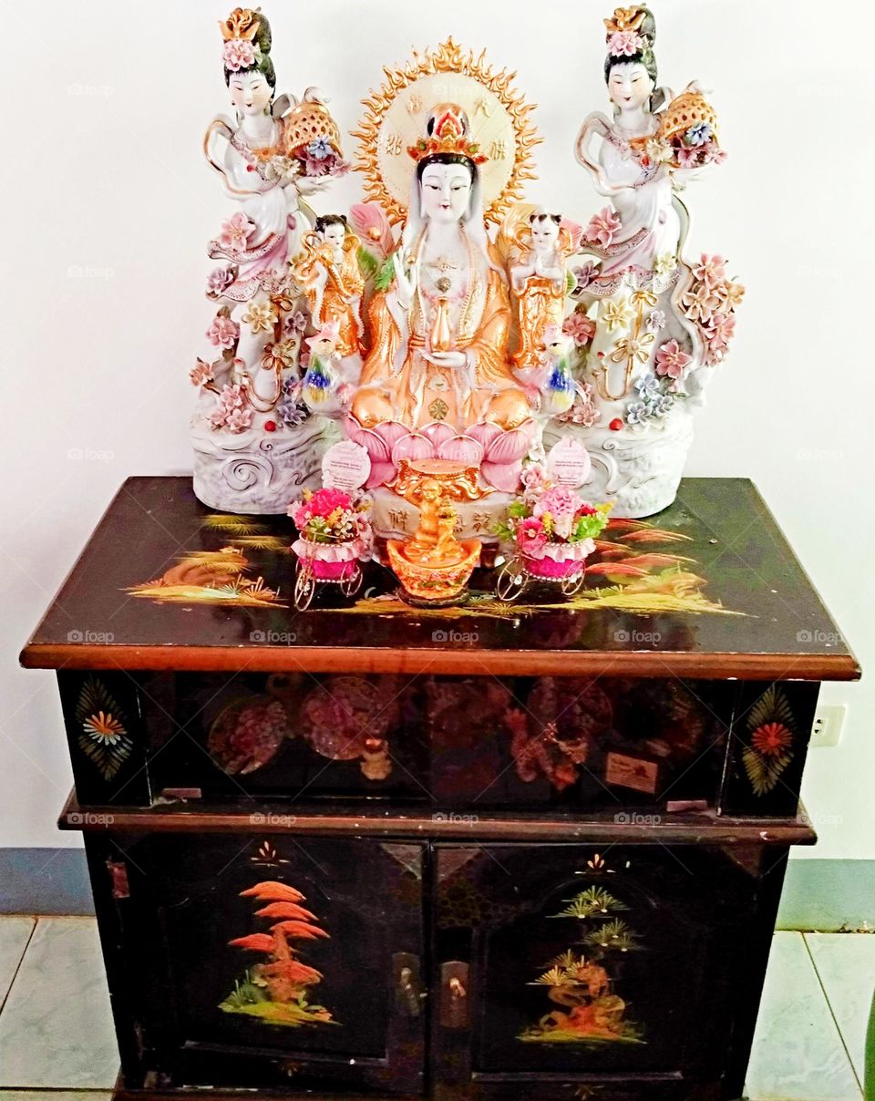 Chinese antique wood cupboard with drawer.