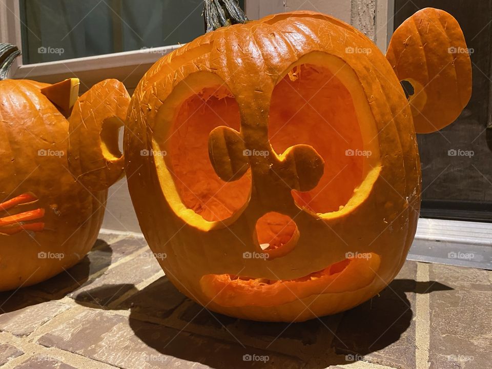 Funny pumpkin carving face with ears halloween