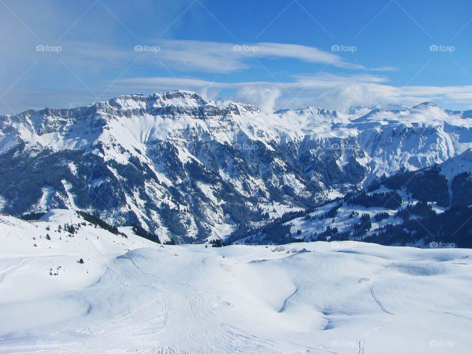 Snow covered mountains and snow