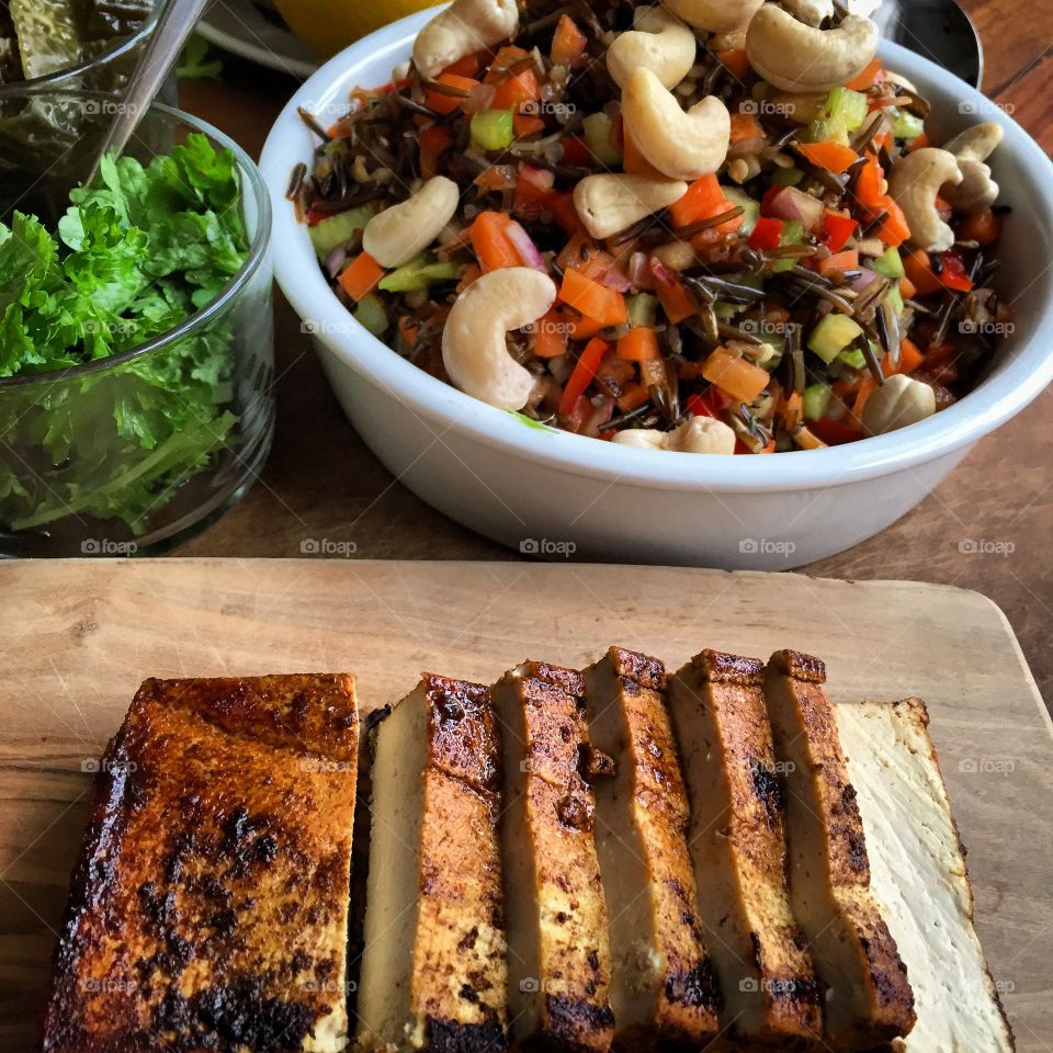 Fried tofu with black rice mixed with vegetables 