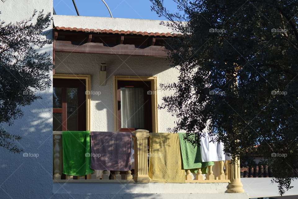 balcony with towels of different colors