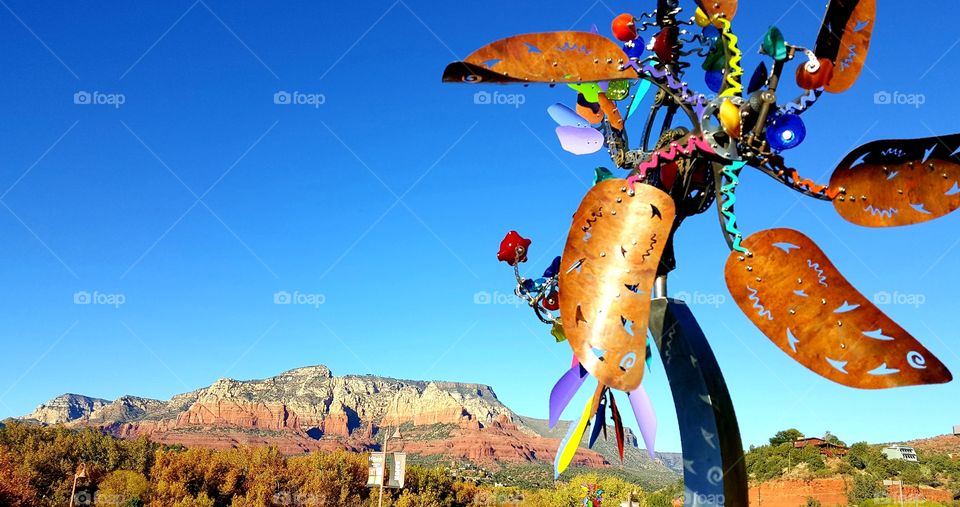 Natural beauty of Sedona enhanced by colorful local artist.