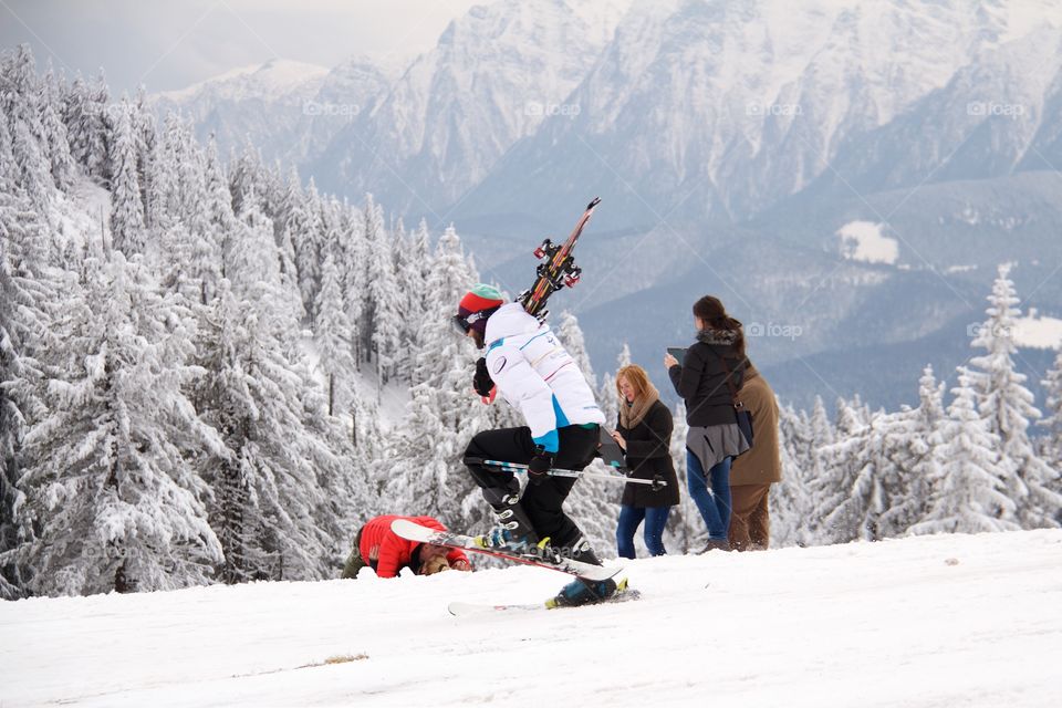 Man skiing in peak Postavarul , Poiana Brasov, Romania 