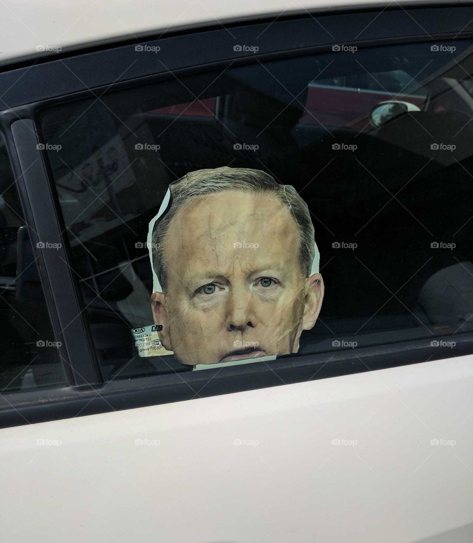 Sean Spicer Sticker on Car Window