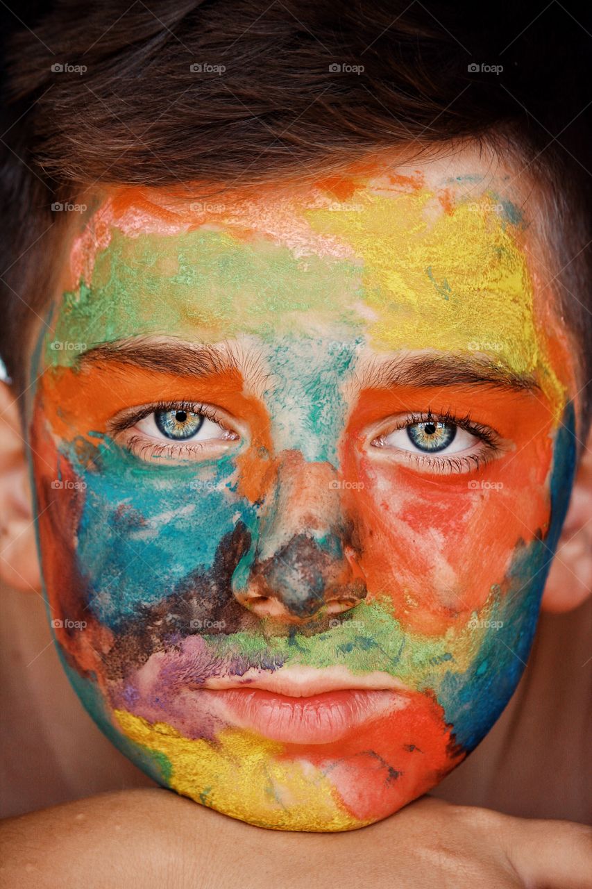 Close-up portrait shot of my nephew . (Face paint)