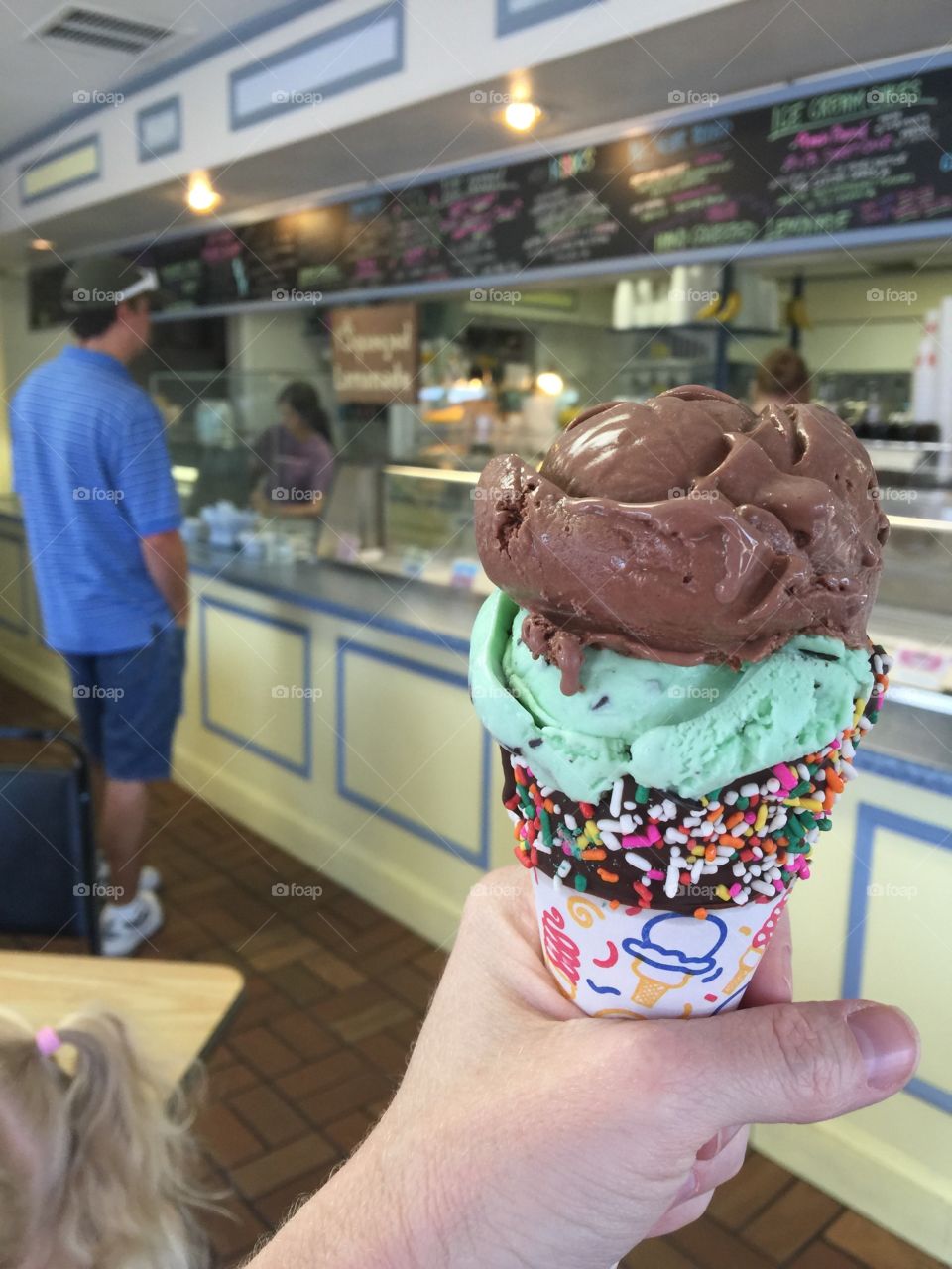 Hand holding ice cream