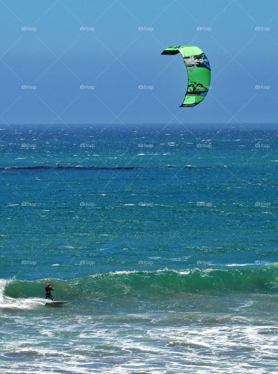 California Windsurfer. Windsurfing In The Ocean Off The California Coast
