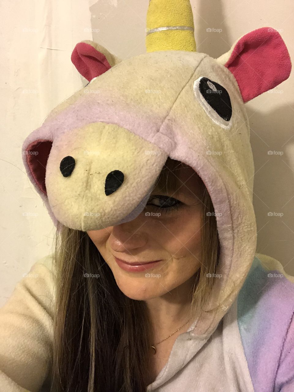 Me wearing my best unicorn onesie 