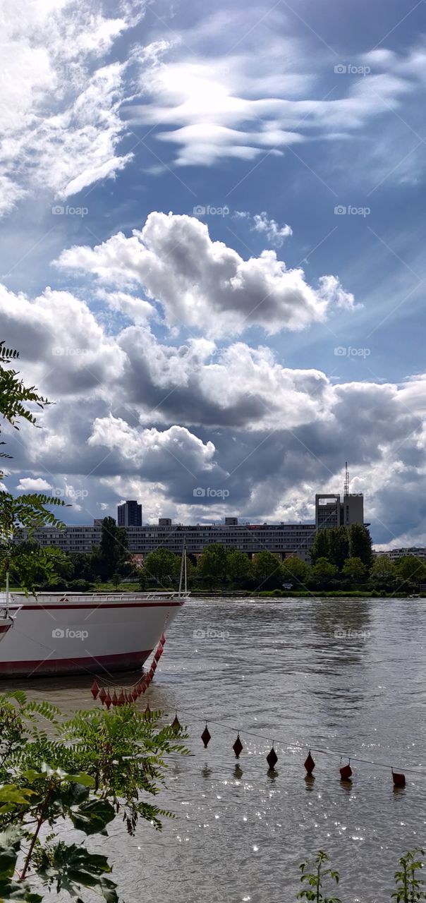 clouds and sunlight over water