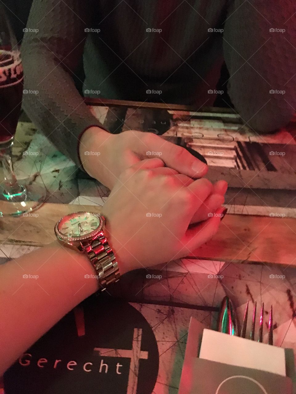 Couple holding hands