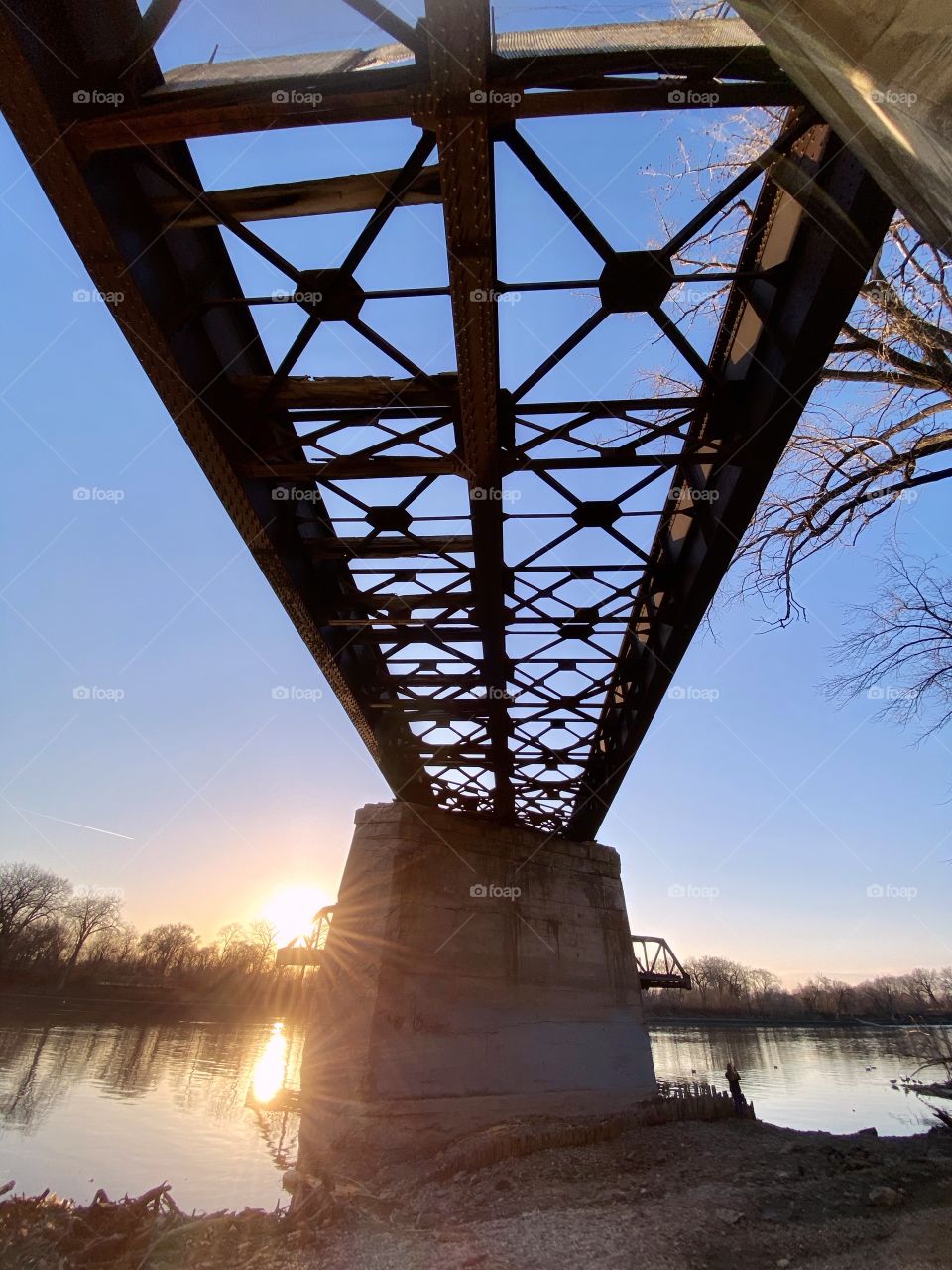 Train bridge at sunset 