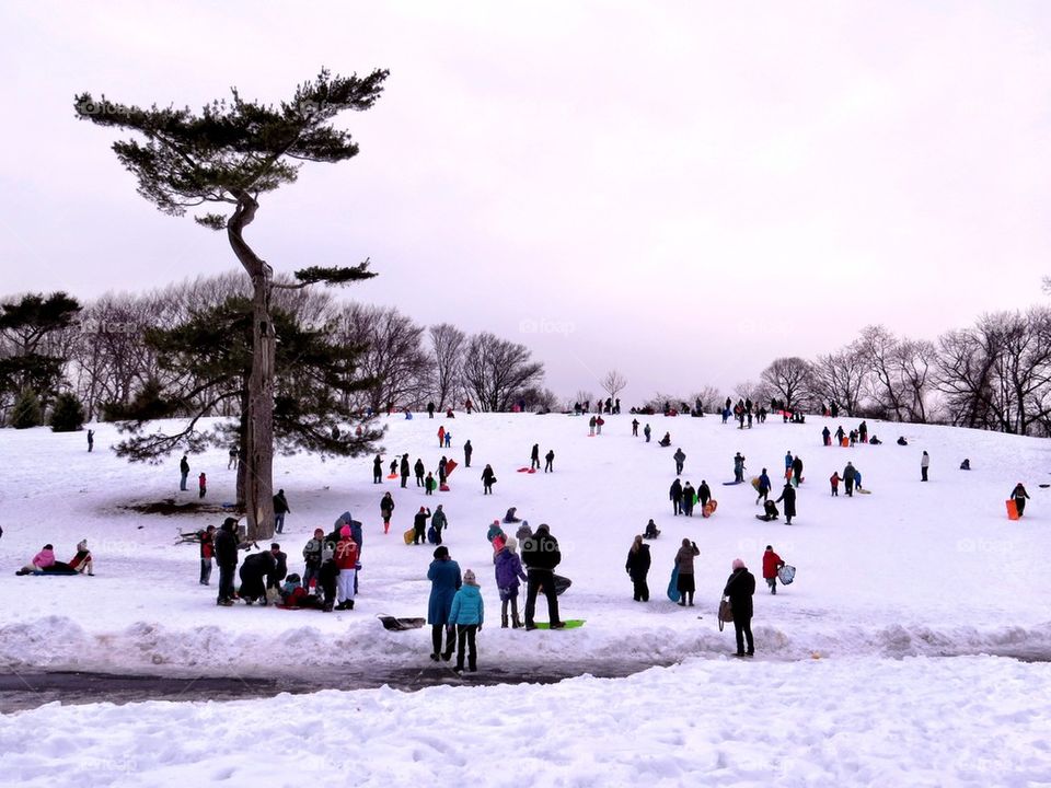 Tourist on snowy landscape