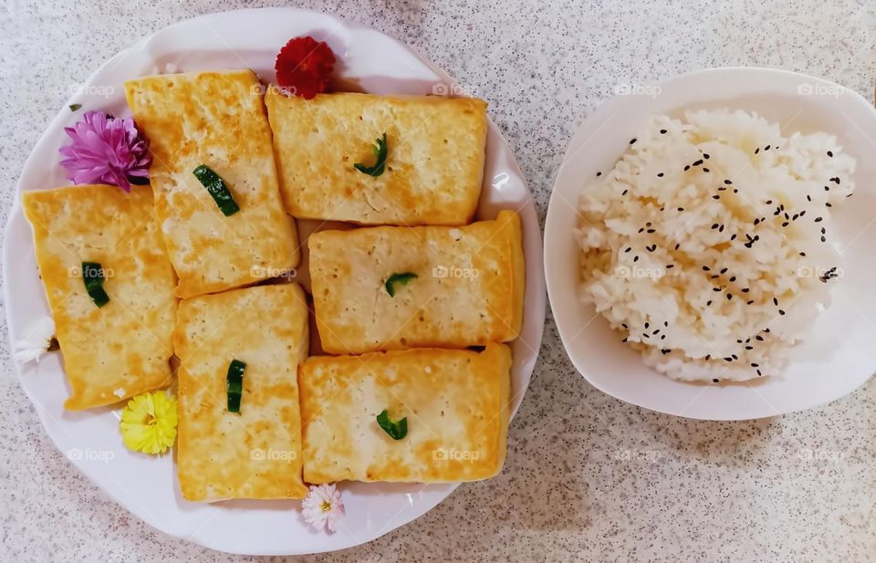 fried tufo with little salt and green spicy. Rice with black sesame seed.
