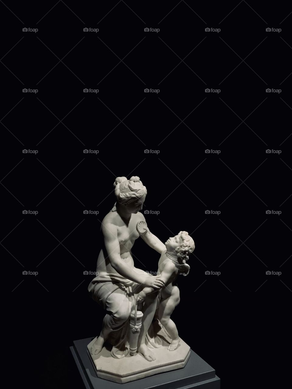 Statue of a mother and child, exhibit at Schwerin Castle in Germany