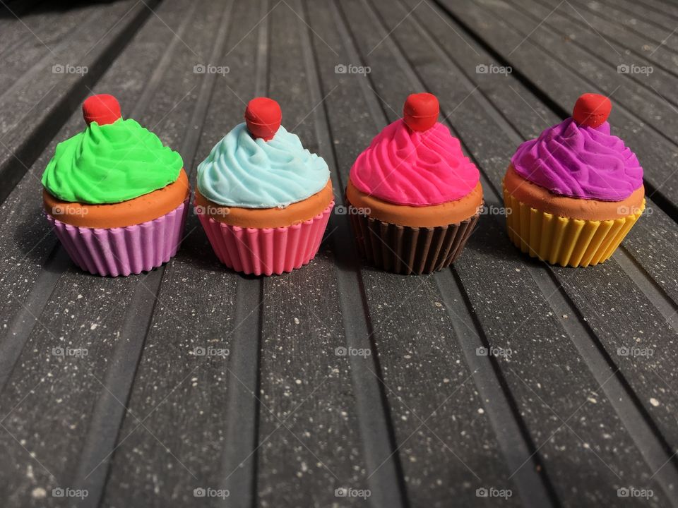 Delicious cupcakes in a row