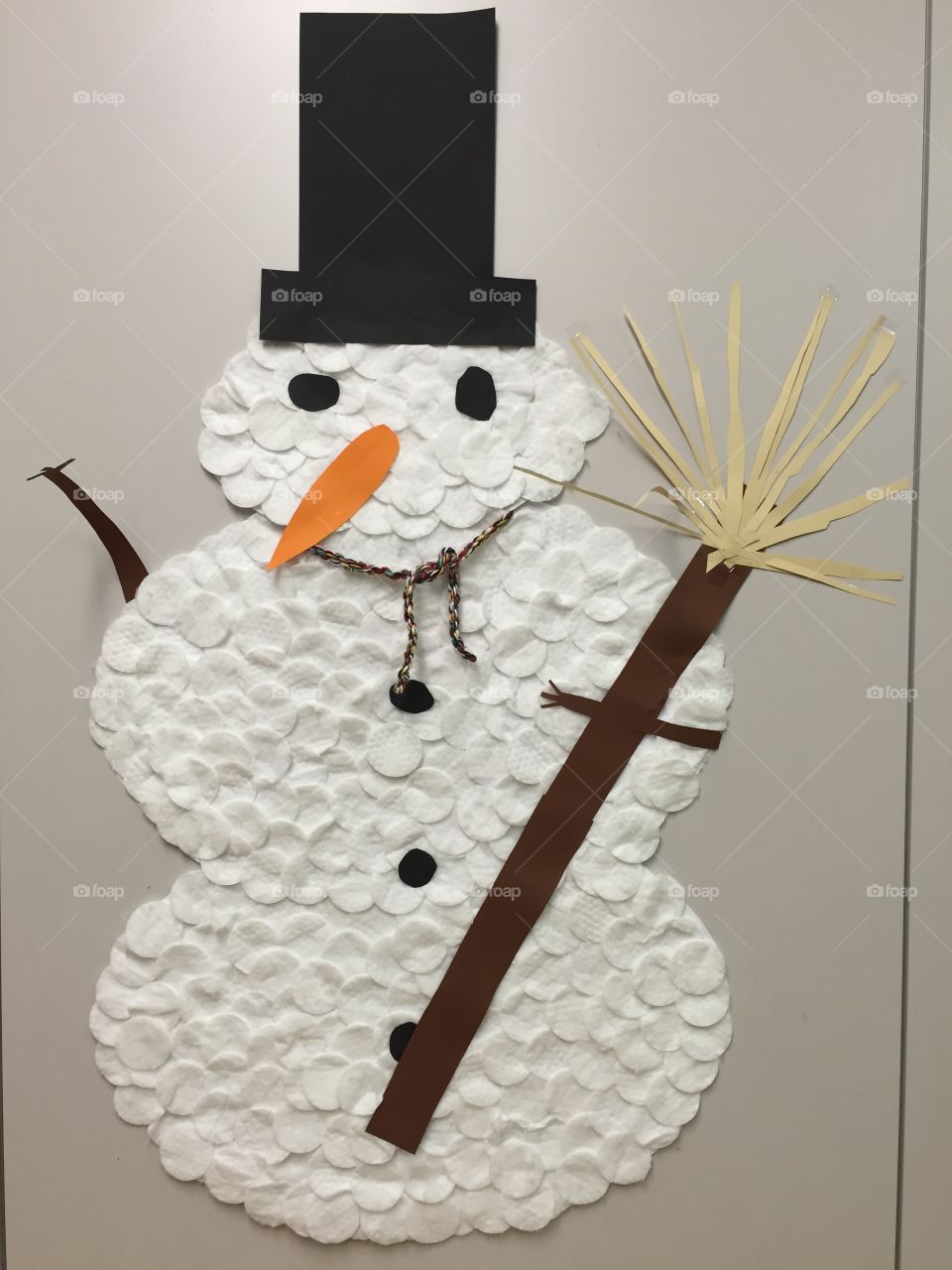 Snow man made of cotton balls - seen in a kindergarten 