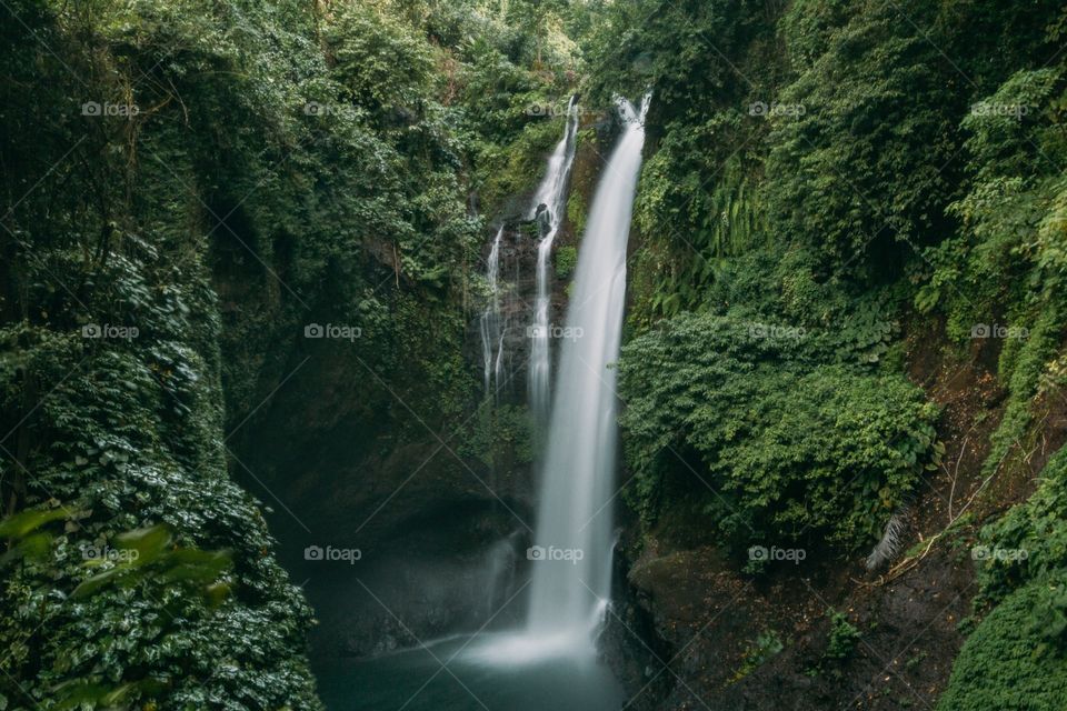One of countless, beautiful cascading waterfalls to be uncovered in Bali, Indonesia