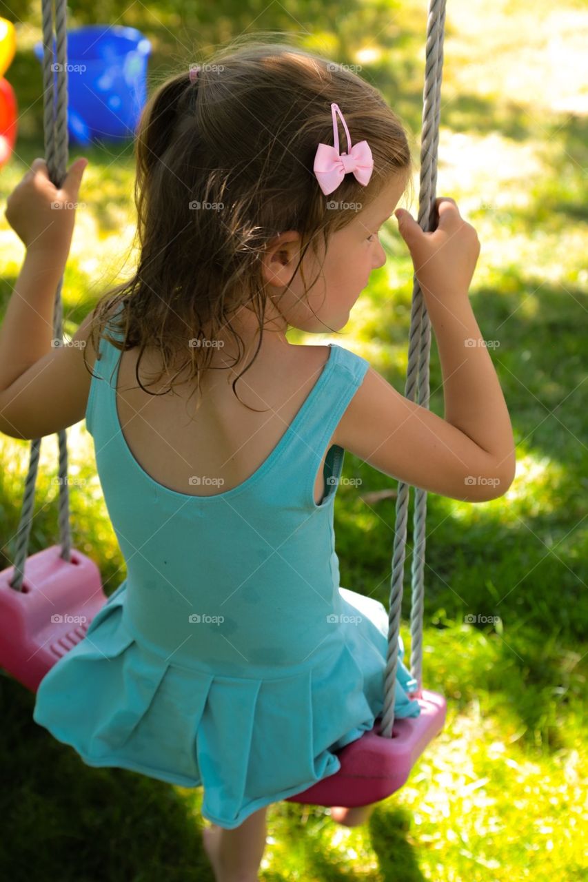 Girl on swing