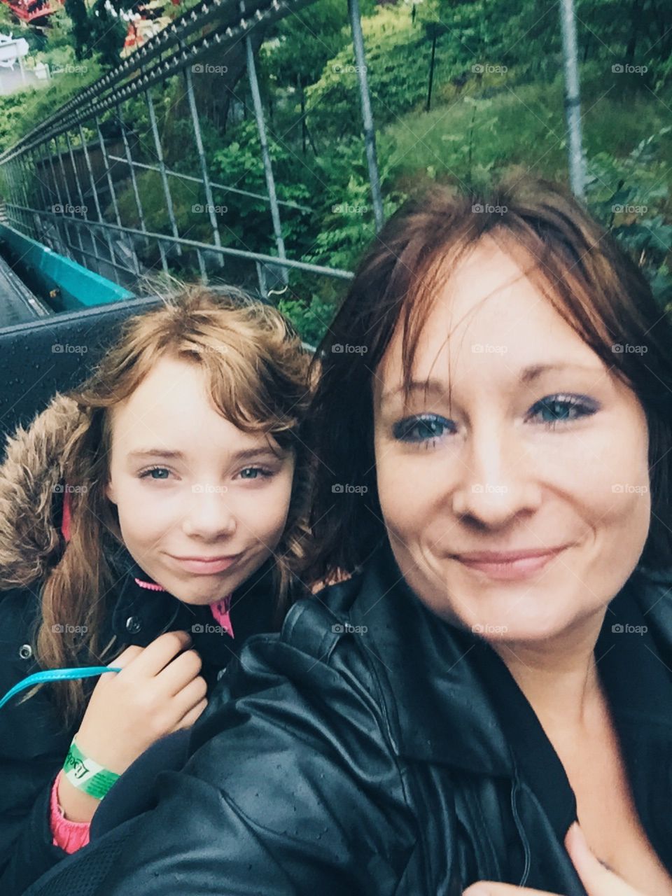 Mother and daughter on the amusement ride 