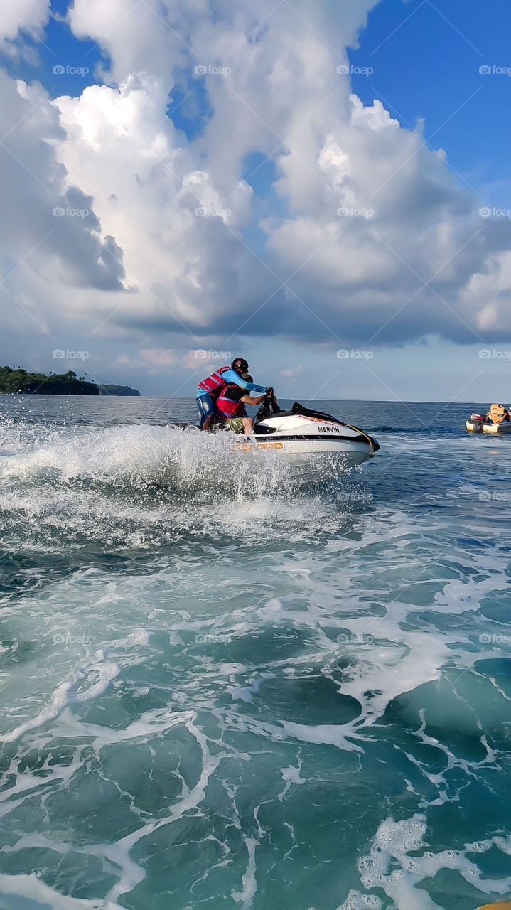 Splashing the water on river bay