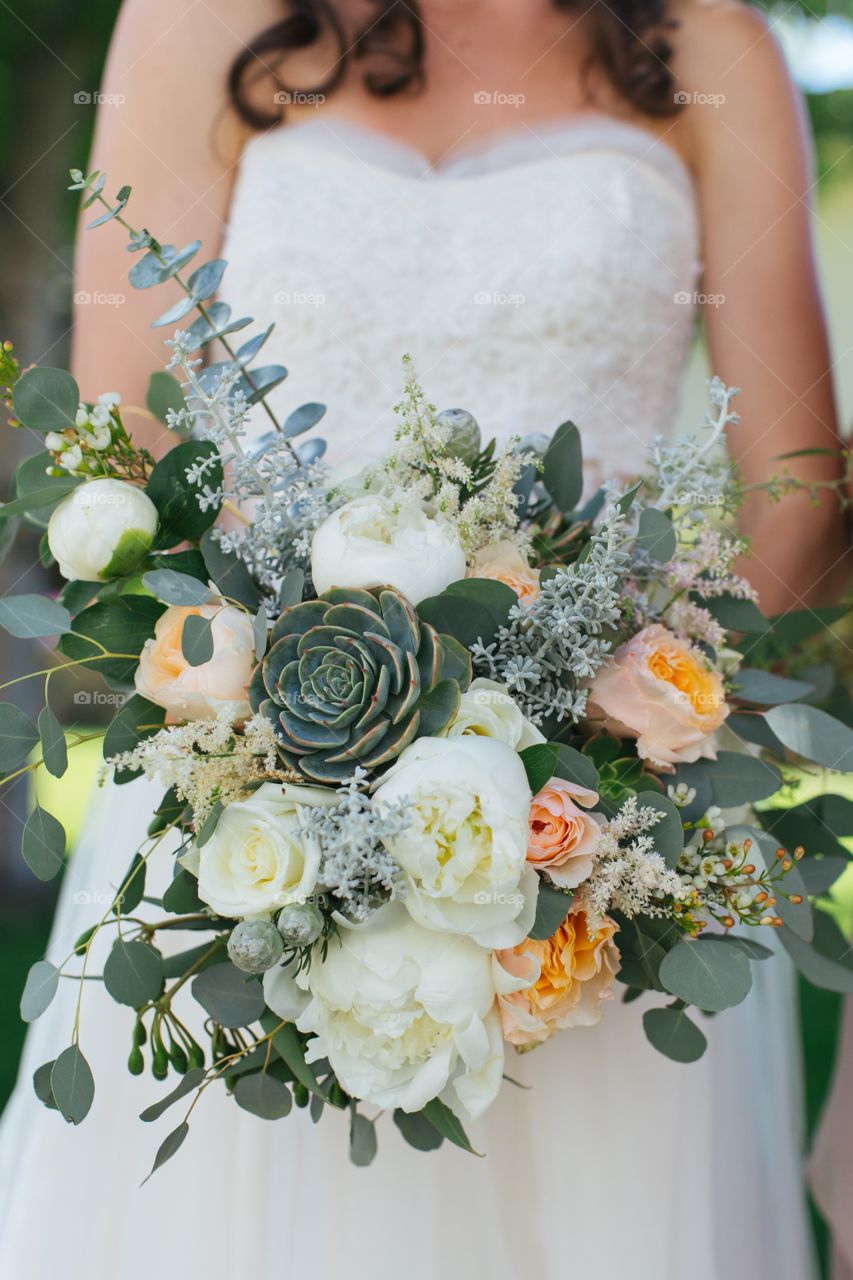 Bride holding her bouquet of flowers