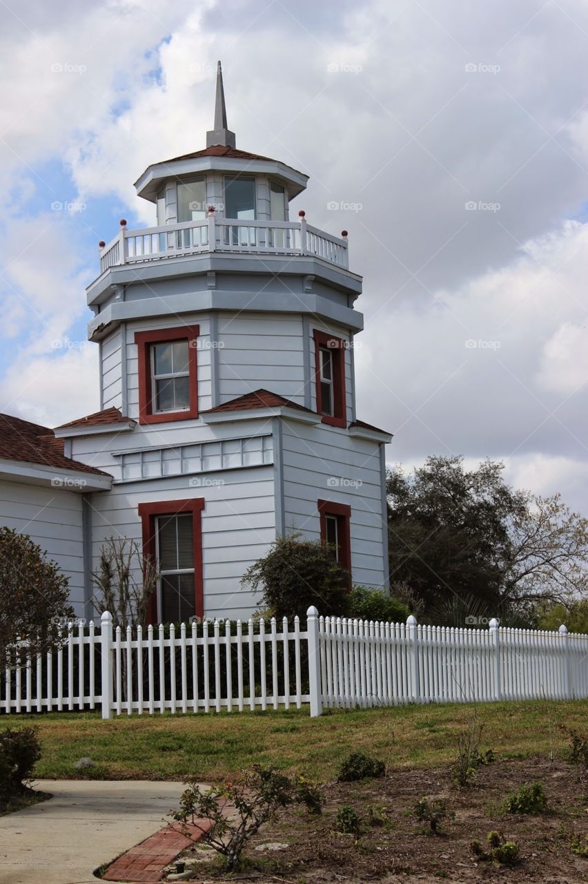 lighthouse home. a house constructed to look like a lighthouse at the sunshine dream village in kissimmee florida