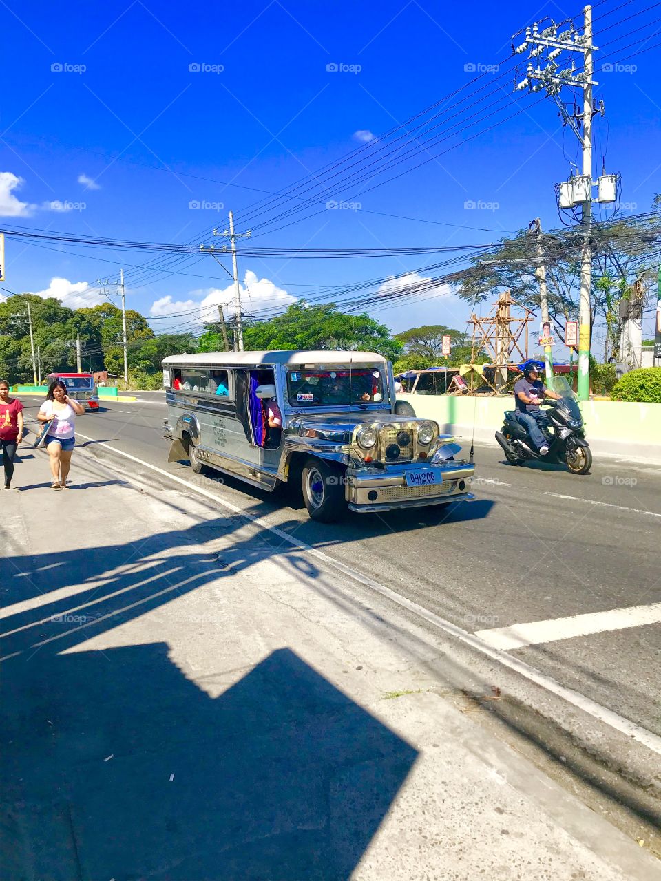 Only in the Philippines. The long version of Jeep's Grand Cherokee, the "Jeepney" as they call it. Can take up to 15 people depending on the length. Easy, convenient ride and cheaper in style.
