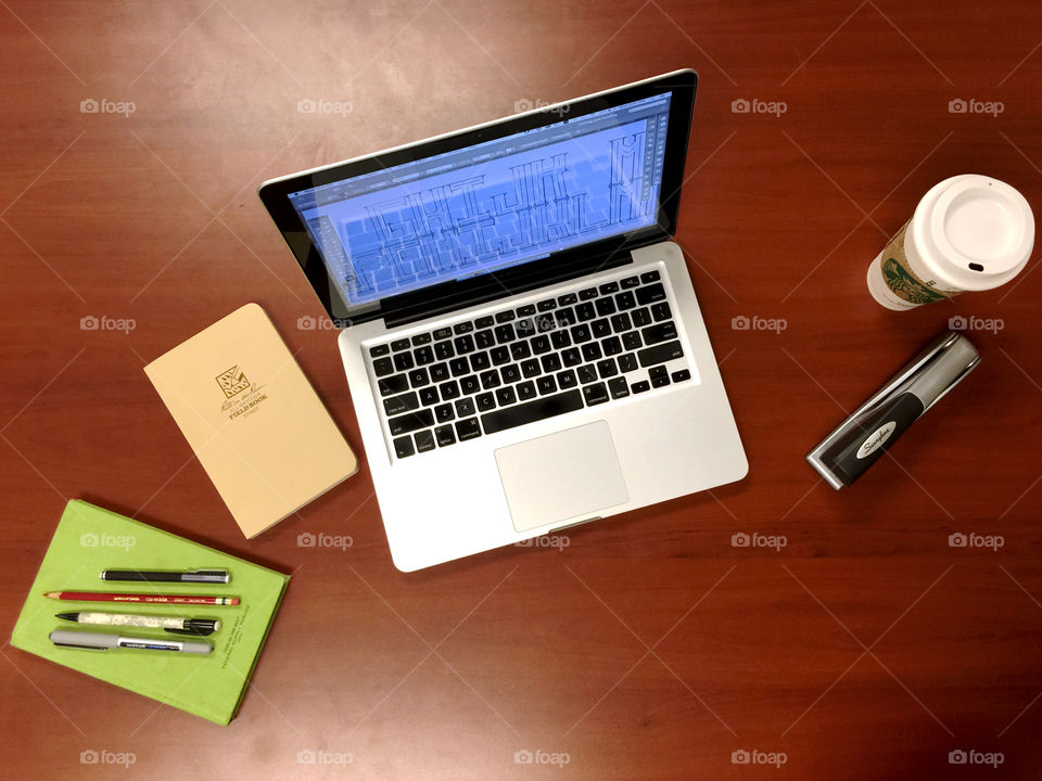 Desktop Organization . Overhead view of items organized atop a desk.