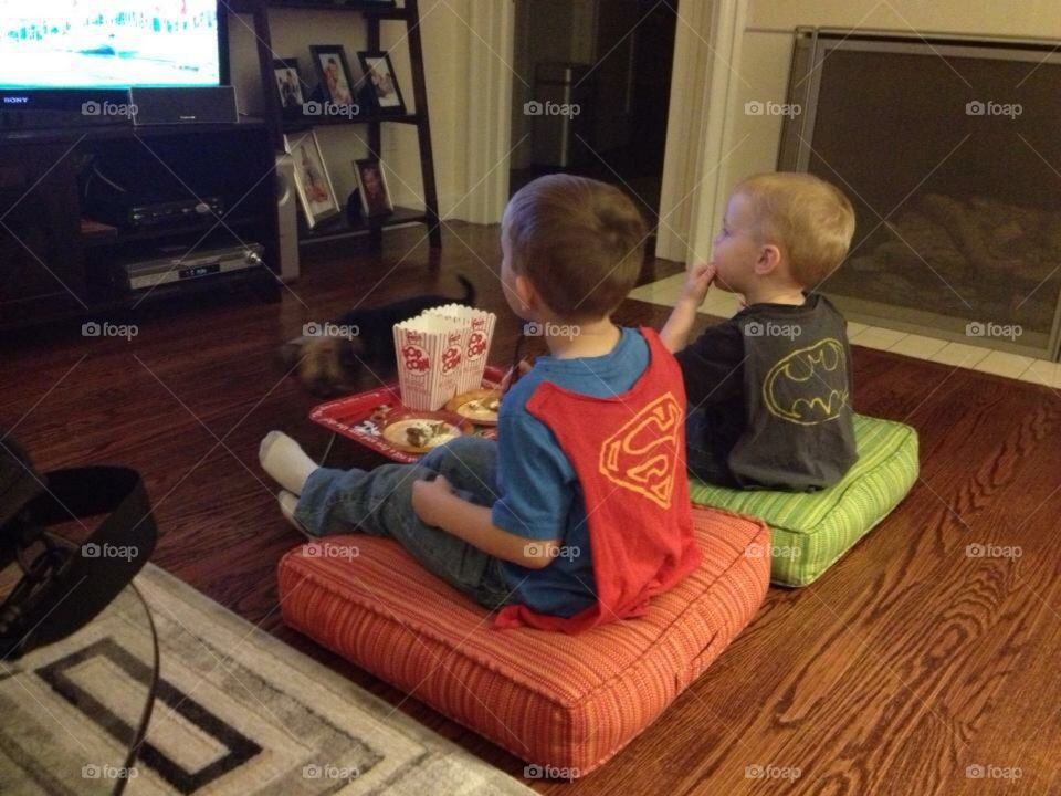 Sons watching movies 