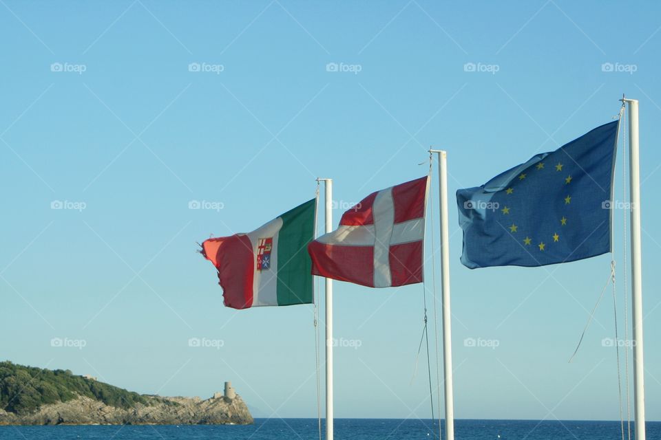 Waving flags on the coast.
