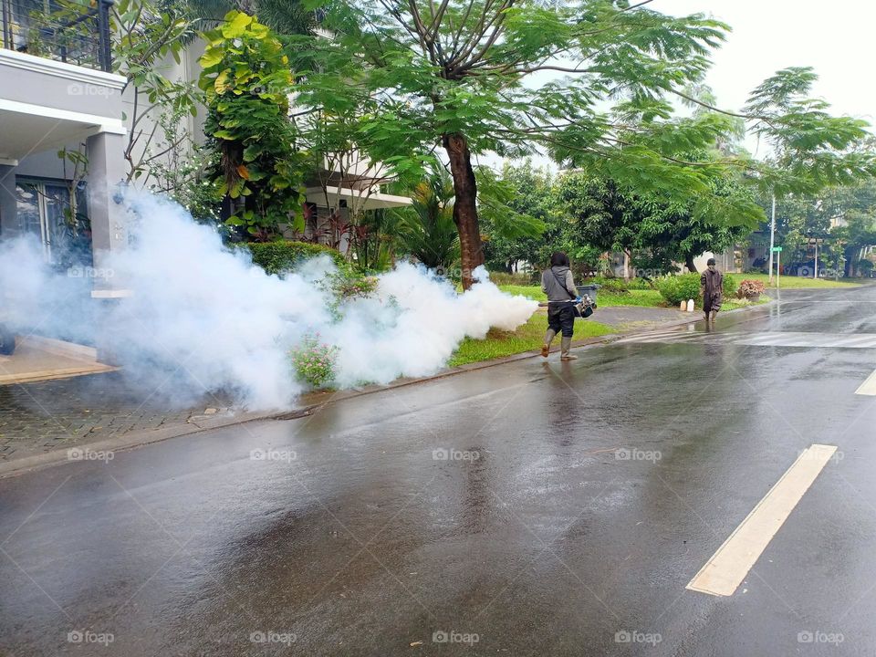 spraying disinfectant to prevent the virus