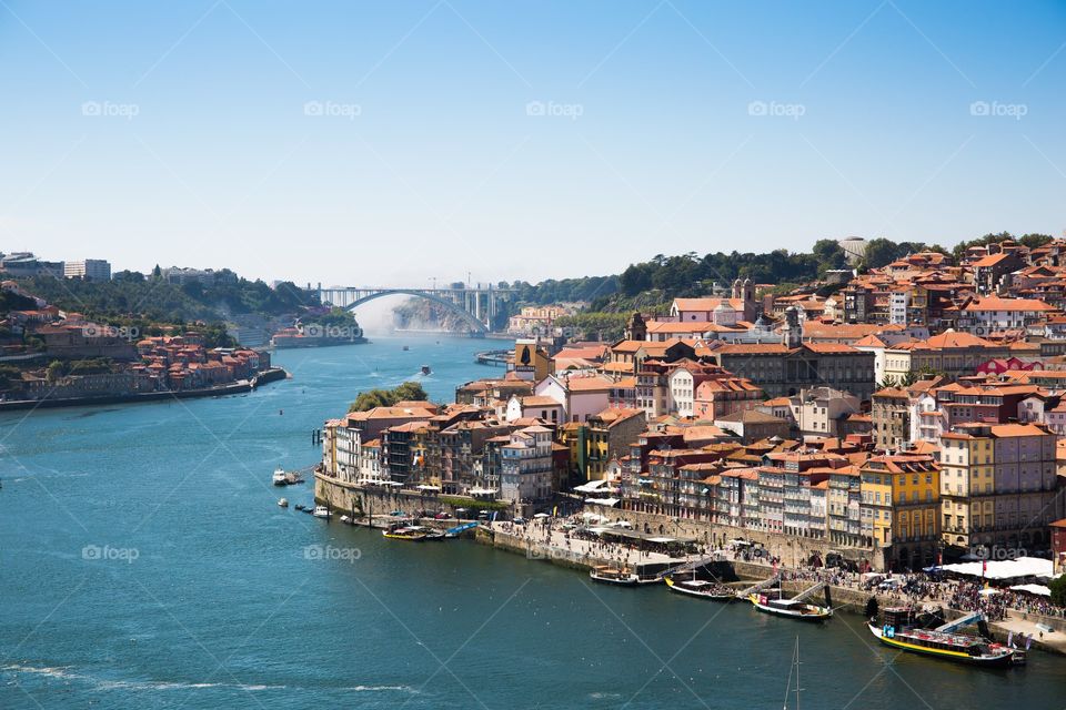 Portugal, Porto, the view on the city and boat floats down the river Duoro