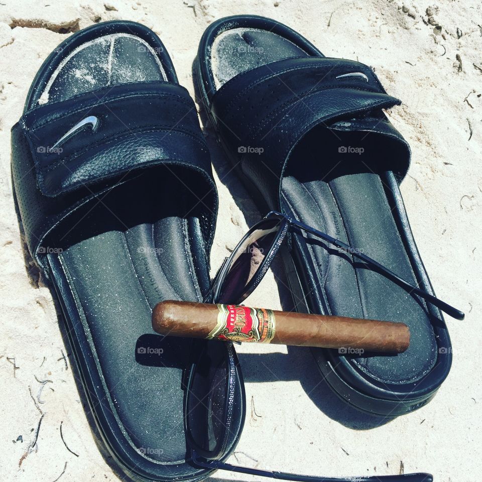 #vacation #puntacana #beach #cigar #flipflops #sunglasses #sand #bluewater #relaxation 