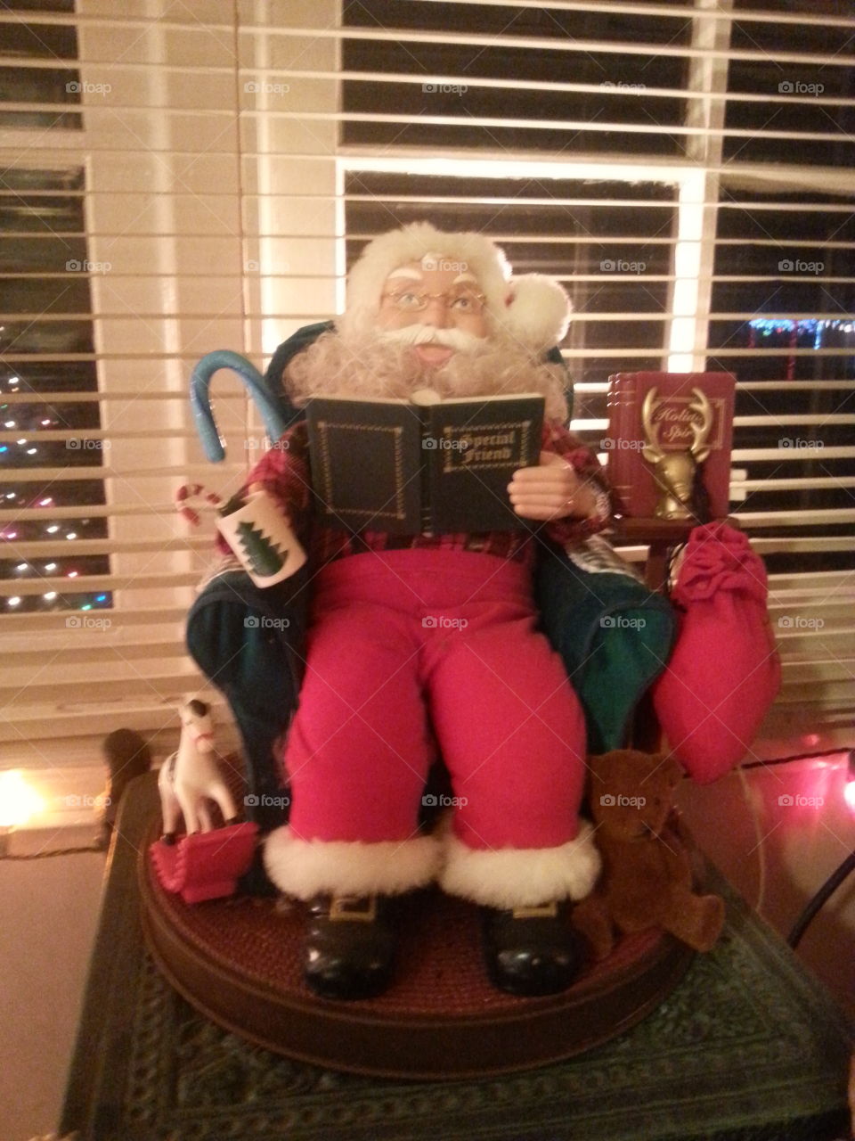 Santa reading a book
